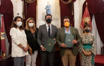 Foto tras la firma del convenio