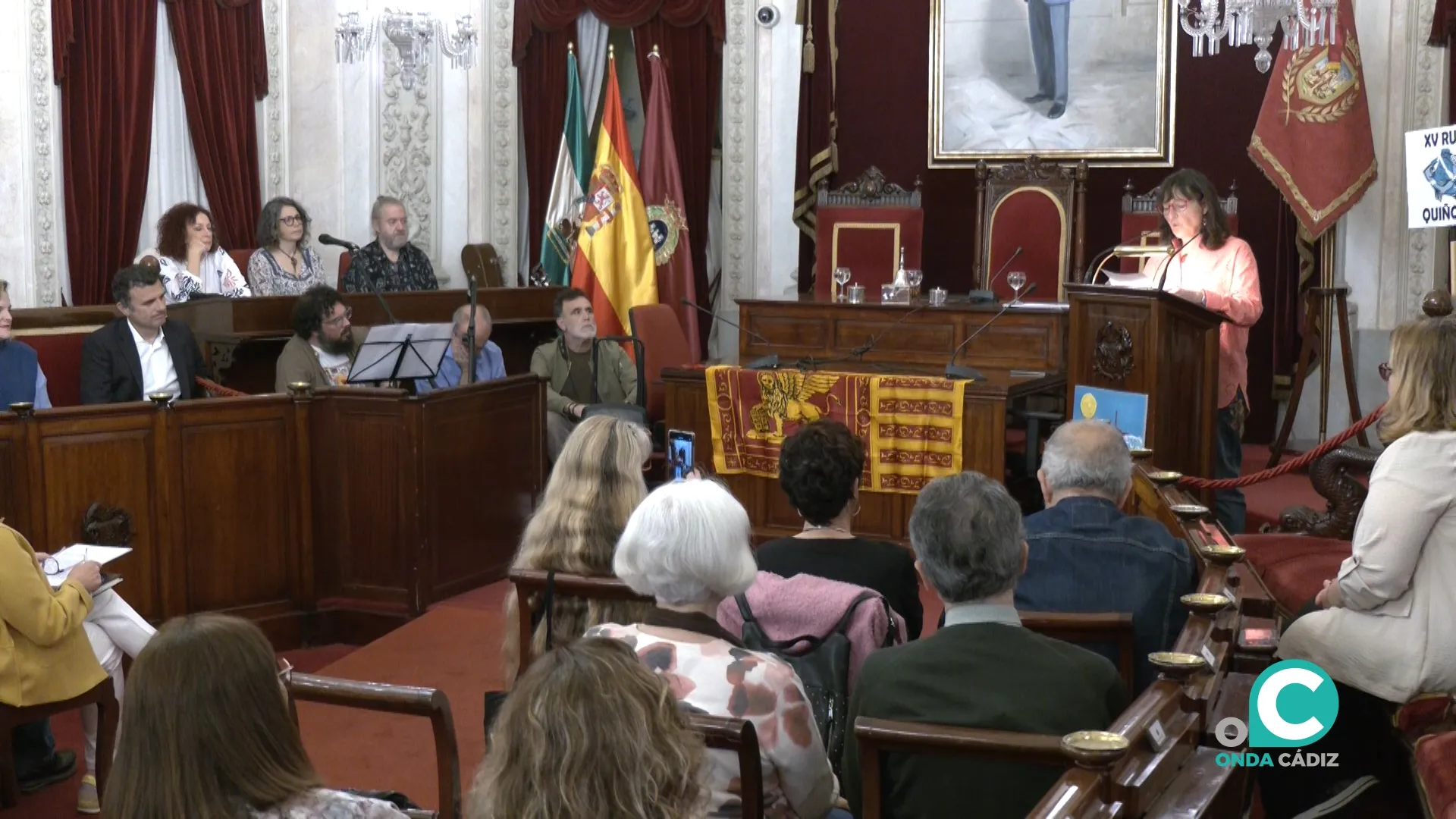 Mariela Quiñones, en su intervención en el inicio de la XV Ruta Quiñones en el Salón de Plenos del Ayuntamiento de Cádiz. Mariela Quiñones, en su intervención en el inicio de la XV Ruta Quiñones en el Salón de Plenos del Ayuntamiento de Cádiz.